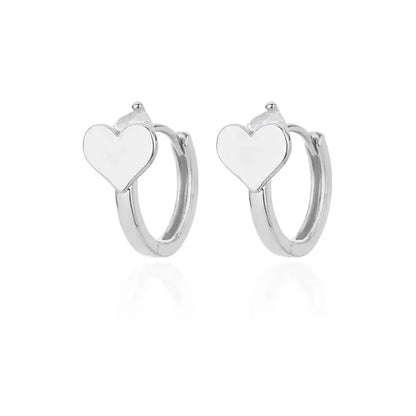 Hollow zircon heart earrings